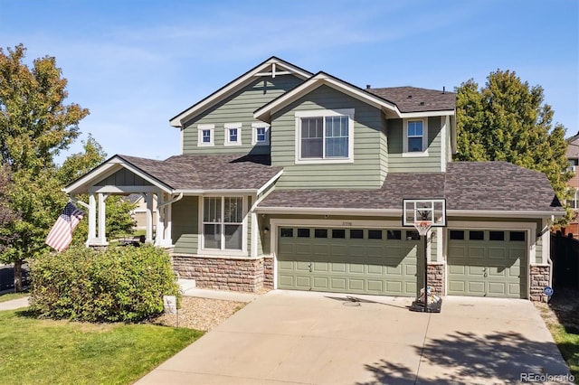 craftsman house featuring a garage