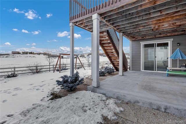 view of snow covered patio