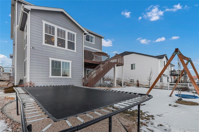 view of snow covered house