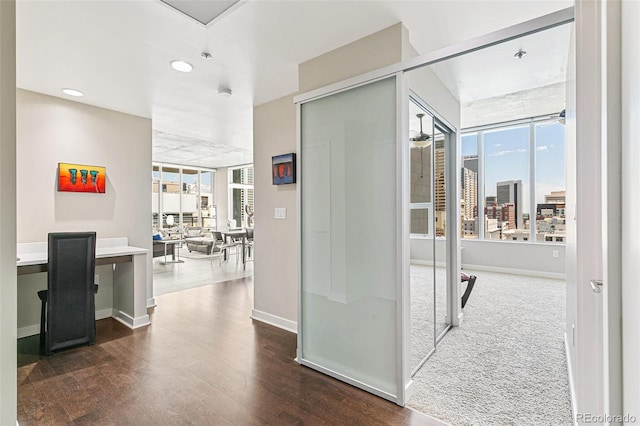 891 14th St Unit 1408, Denver, CO 80202 - hall with healthy amount of natural light, recessed lighting, and dark wood-style floors
