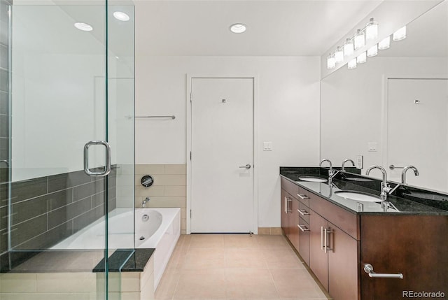 891 14th St Unit 1408, Denver, CO 80202 - bathroom featuring double vanity, a bath, a shower stall, tile patterned flooring, and recessed lighting