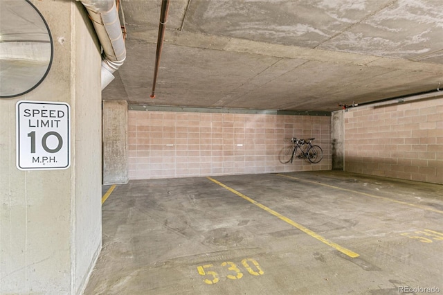 891 14th St Unit 1408, Denver, CO 80202 - parking garage featuring concrete block wall