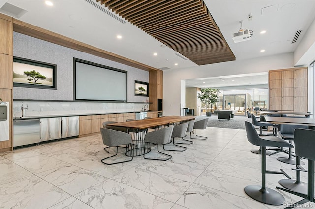 891 14th St Unit 1408, Denver, CO 80202 - home theater room featuring recessed lighting and light marble finish floors