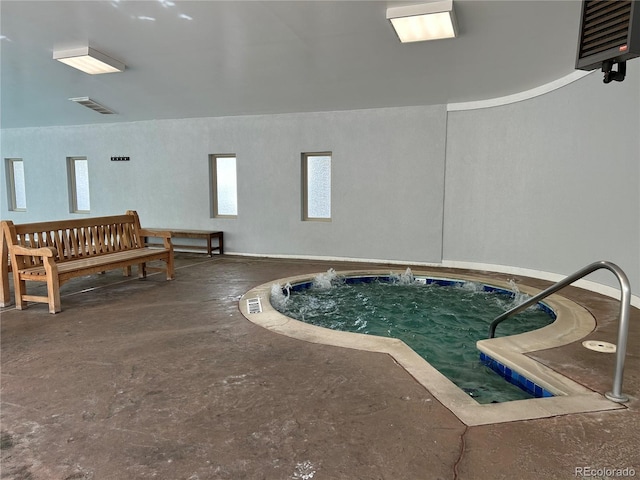 view of pool with an indoor hot tub and a pool