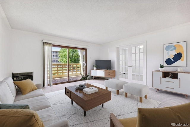 660 S Alton Way Unit 3B, Denver, CO 80247 - living room with carpet flooring, french doors, and a textured ceiling