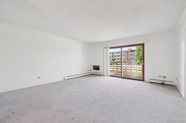 660 S Alton Way Unit 3B, Denver, CO 80247 - spare room featuring baseboard heating, a baseboard heating unit, carpet flooring, baseboards, and ornamental molding
