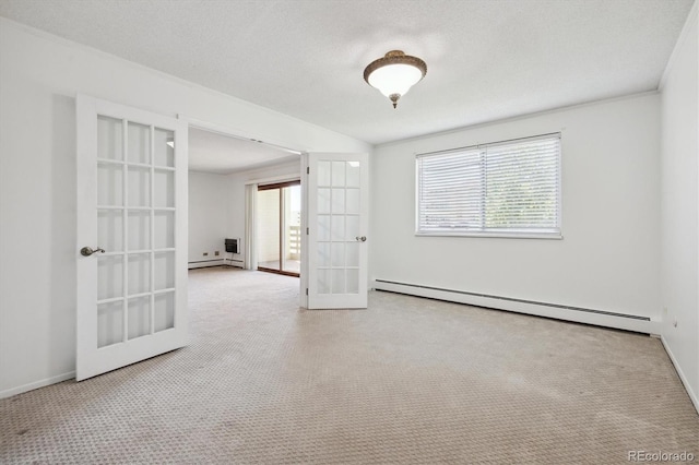 660 S Alton Way Unit 3B, Denver, CO 80247 - empty room featuring french doors, healthy amount of natural light, carpet flooring, and a baseboard heating unit