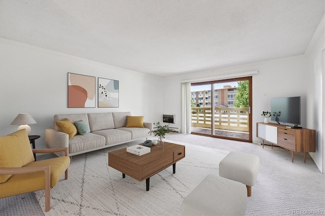 660 S Alton Way Unit 3B, Denver, CO 80247 - carpeted living room featuring crown molding