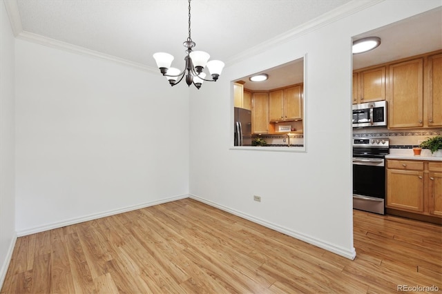660 S Alton Way Unit 3B, Denver, CO 80247 - unfurnished dining area with crown molding, light wood-style flooring, a chandelier, and baseboards