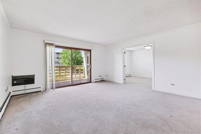 660 S Alton Way Unit 3B, Denver, CO 80247 - carpeted spare room with baseboard heating, baseboards, and a textured ceiling