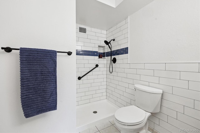 660 S Alton Way Unit 3B, Denver, CO 80247 - full bath with a stall shower, toilet, tile walls, and pet washing area