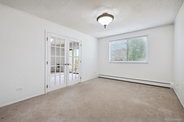 660 S Alton Way Unit 3B, Denver, CO 80247 - unfurnished room featuring french doors, a baseboard radiator, a textured ceiling, carpet, and baseboards