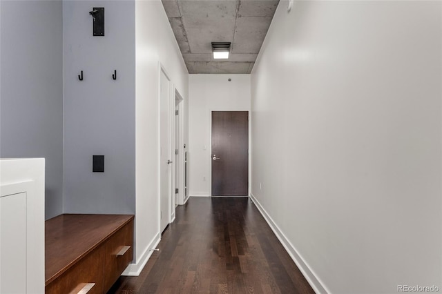 corridor featuring dark wood-type flooring