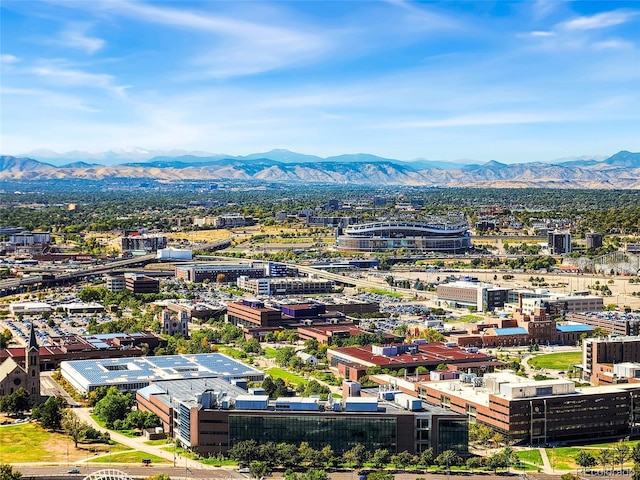 birds eye view of property with a mountain view