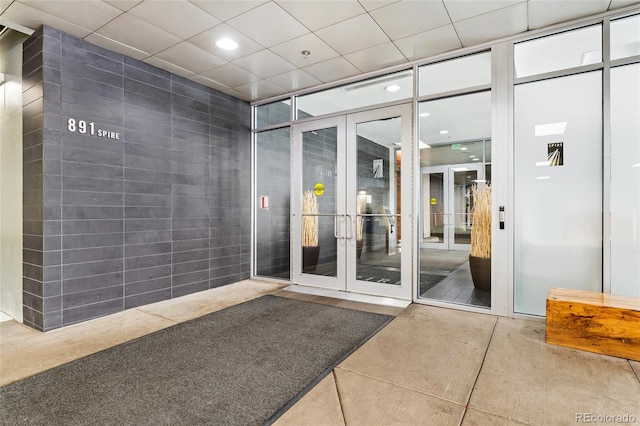 entrance to property featuring french doors