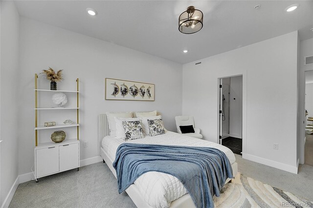 8530 W 52nd Ave Unit A1, Arvada, CO 80002 - bedroom with light colored carpet, baseboards, and recessed lighting