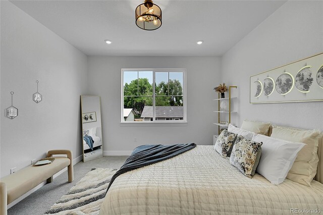 8530 W 52nd Ave Unit A1, Arvada, CO 80002 - carpeted bedroom featuring baseboards and recessed lighting