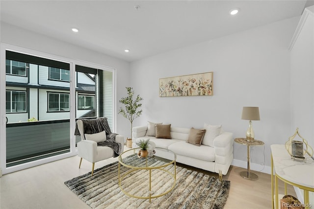 8530 W 52nd Ave Unit A1, Arvada, CO 80002 - living room with wood finished floors, recessed lighting, and baseboards