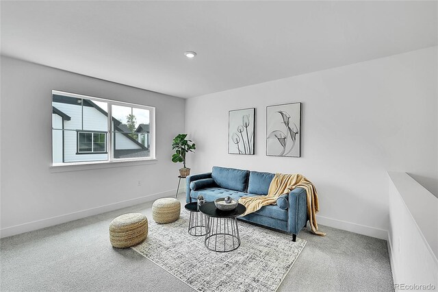8530 W 52nd Ave Unit A1, Arvada, CO 80002 - living room with carpet floors, baseboards, and recessed lighting