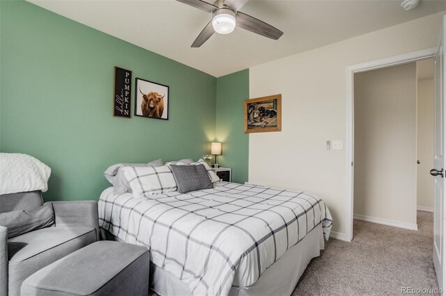 bedroom featuring a ceiling fan, baseboards, and carpet floors