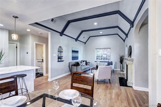 1378 Forest St, Denver, CO 80220 - dining room with vaulted ceiling, light wood-style flooring, baseboards, and recessed lighting