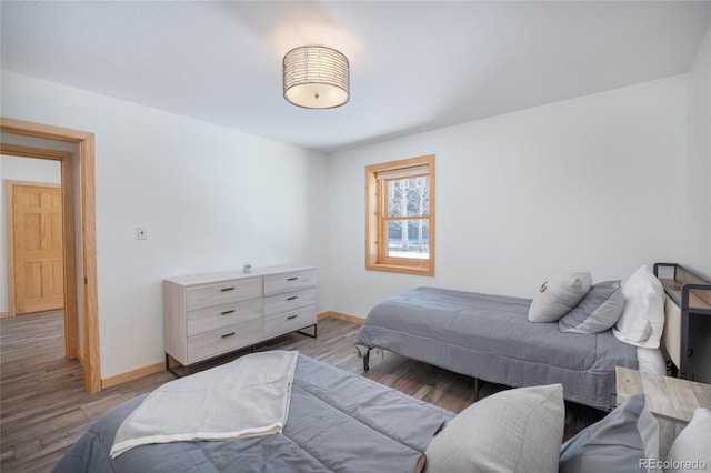 bedroom with light hardwood / wood-style flooring