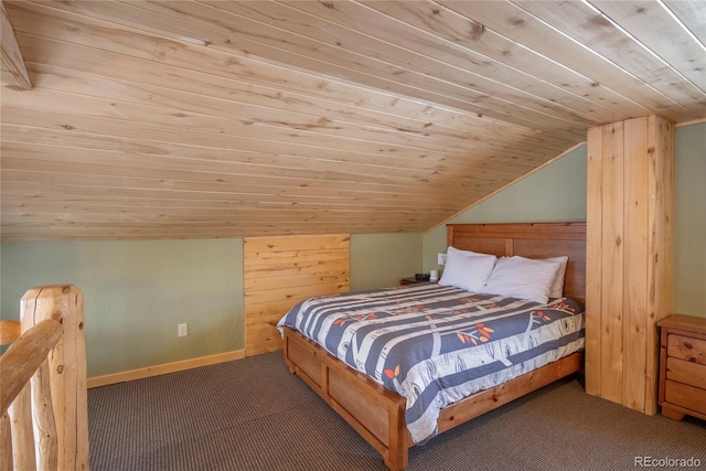 bedroom with wood ceiling, vaulted ceiling, and dark carpet