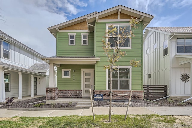 910 Promenade Dr, Superior, CO 80027 - view of front of property with brick siding and a porch