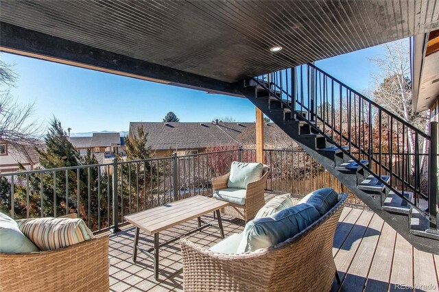 wooden deck with an outdoor hangout area