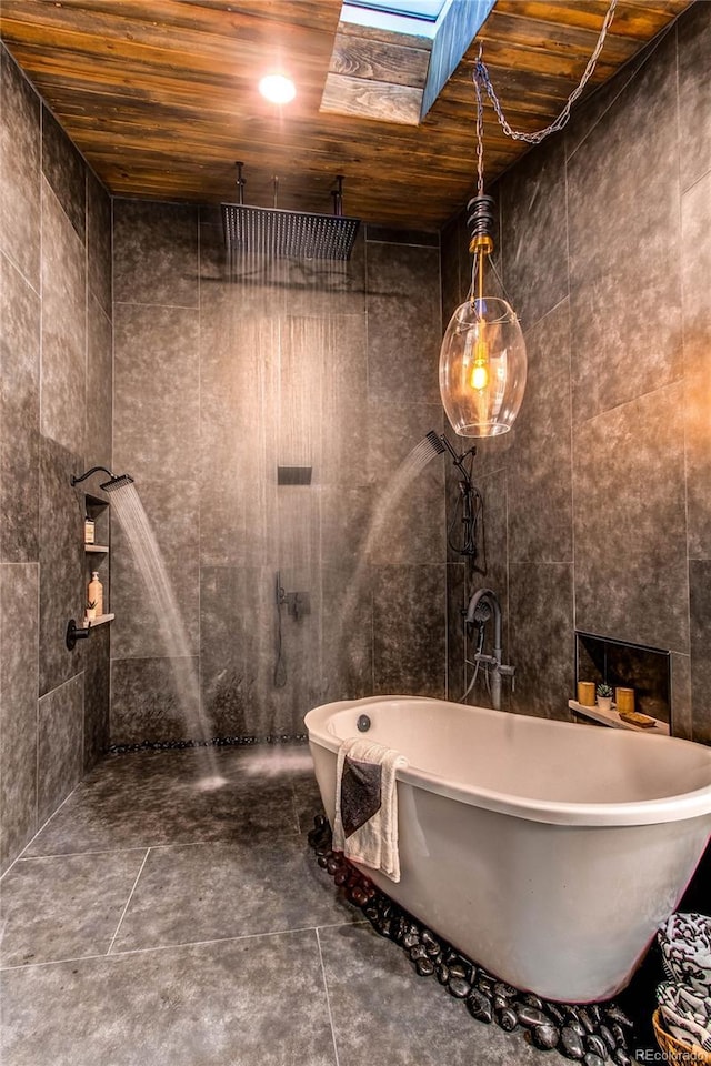 bathroom featuring wood ceiling and a bath