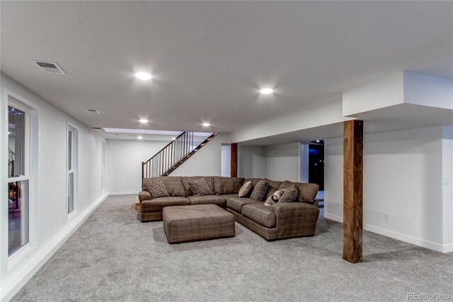 living room with light colored carpet