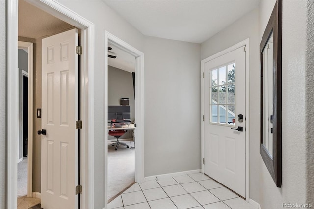 943 Reynolds Farm Ln Unit D8, Longmont, CO 80503 - doorway to outside featuring an office area and light tile patterned flooring