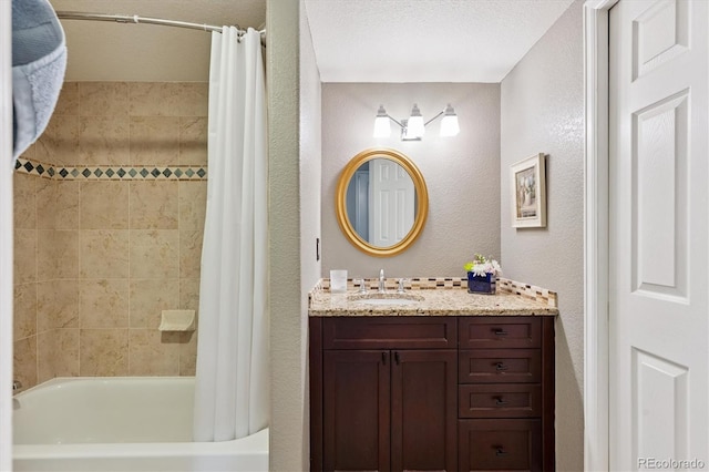 943 Reynolds Farm Ln Unit D8, Longmont, CO 80503 - full bath with a textured wall, vanity, and shower / tub combo with curtain