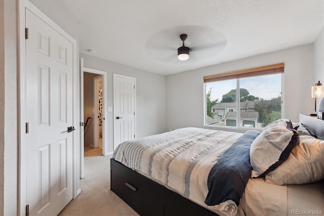 943 Reynolds Farm Ln Unit D8, Longmont, CO 80503 - bedroom with light colored carpet and ceiling fan