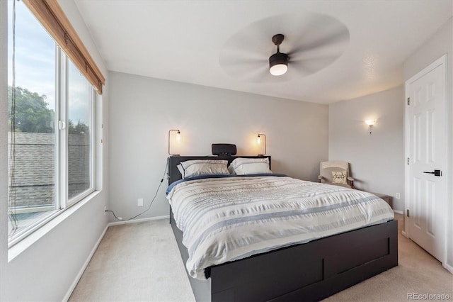 943 Reynolds Farm Ln Unit D8, Longmont, CO 80503 - bedroom featuring light colored carpet and ceiling fan