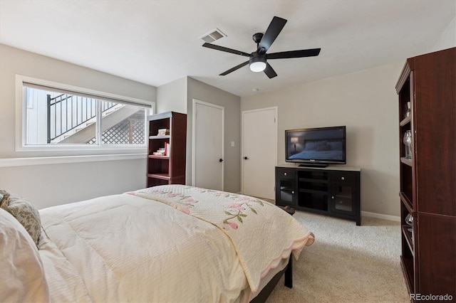 943 Reynolds Farm Ln Unit D8, Longmont, CO 80503 - carpeted bedroom with ceiling fan and baseboards