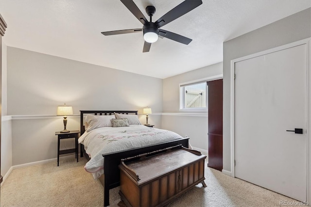 943 Reynolds Farm Ln Unit D8, Longmont, CO 80503 - carpeted bedroom with baseboards and a ceiling fan