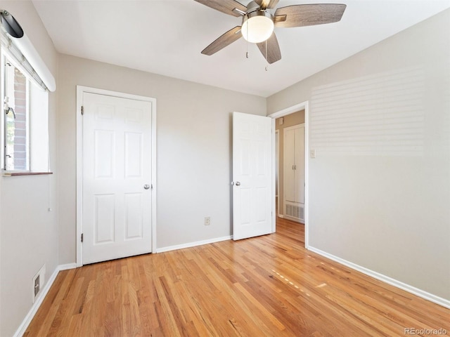 unfurnished bedroom with light hardwood / wood-style floors and ceiling fan