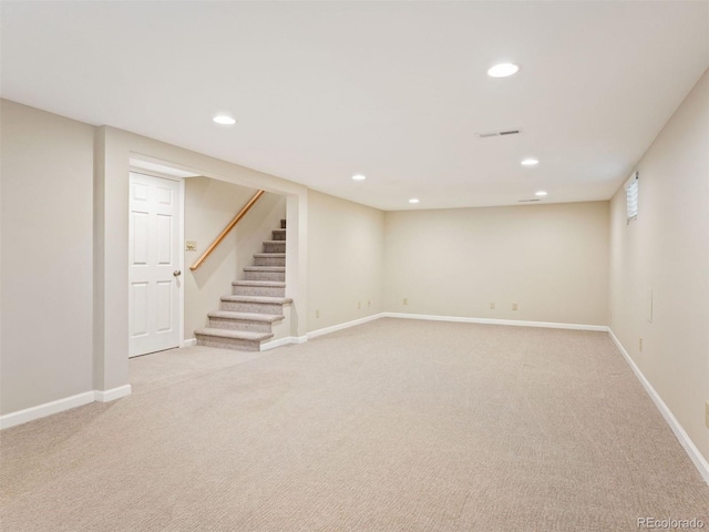 basement with light carpet