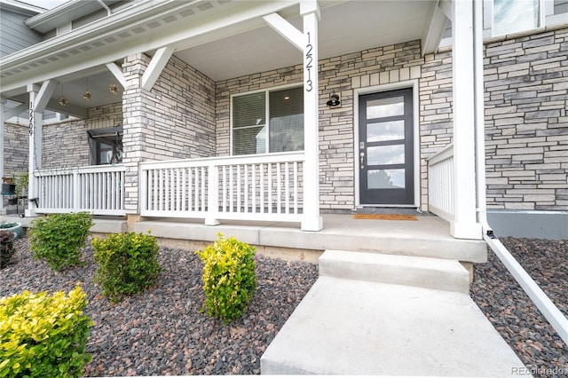 12213 Race St, Northglenn, CO 80241 - property entrance with a porch