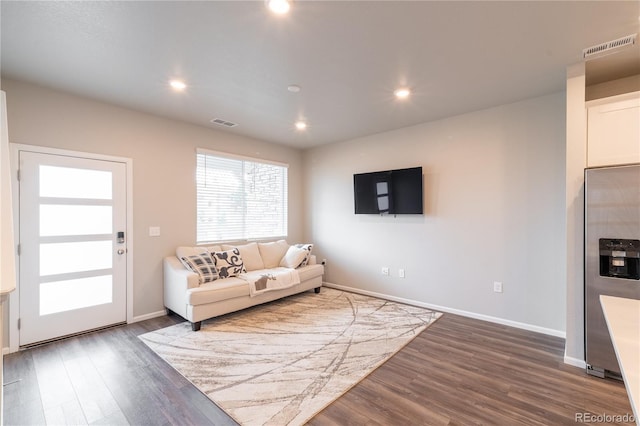 12213 Race St, Northglenn, CO 80241 - living room featuring dark wood finished floors and recessed lighting