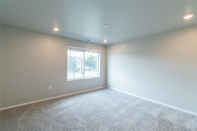12213 Race St, Northglenn, CO 80241 - spare room featuring carpet floors and recessed lighting