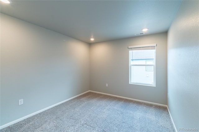 12213 Race St, Northglenn, CO 80241 - spare room featuring carpet floors and recessed lighting