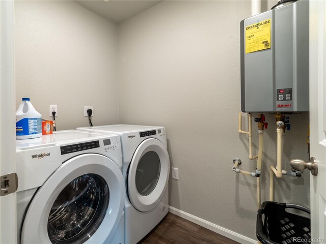 12213 Race St, Northglenn, CO 80241 - washroom featuring water heater, washer and dryer, and dark wood-type flooring