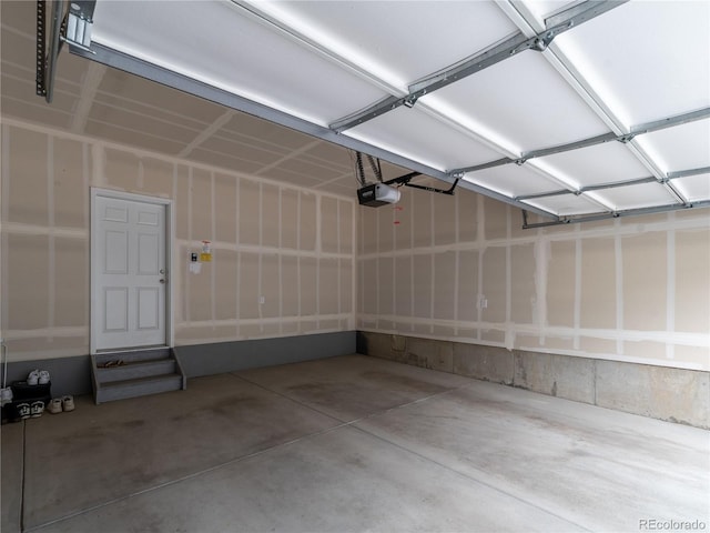 12213 Race St, Northglenn, CO 80241 - garage featuring a garage door opener