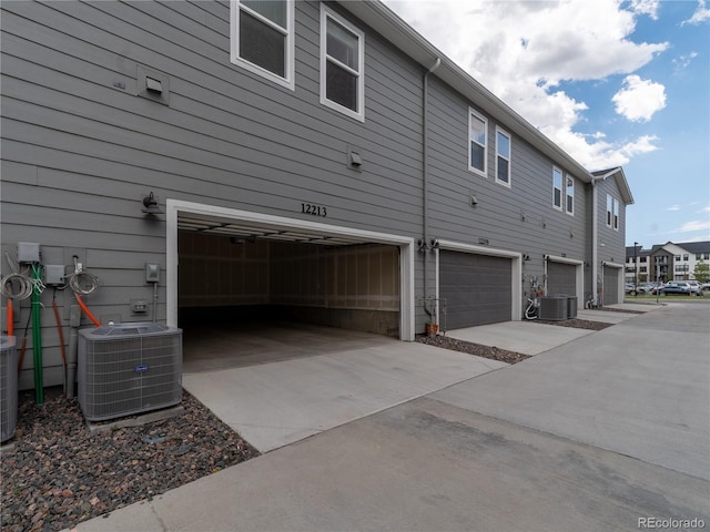 12213 Race St, Northglenn, CO 80241 - view of home's exterior featuring an attached garage, driveway, and a residential view