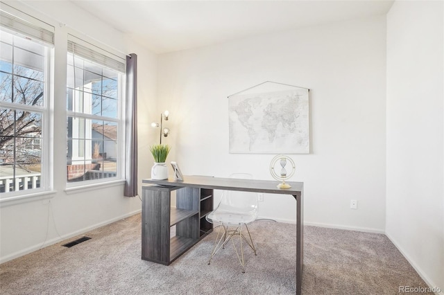 4844 Mt Evans St, Brighton, CO 80601 - carpeted home office featuring baseboards