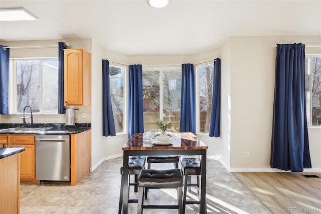 4844 Mt Evans St, Brighton, CO 80601 - dining area featuring baseboards