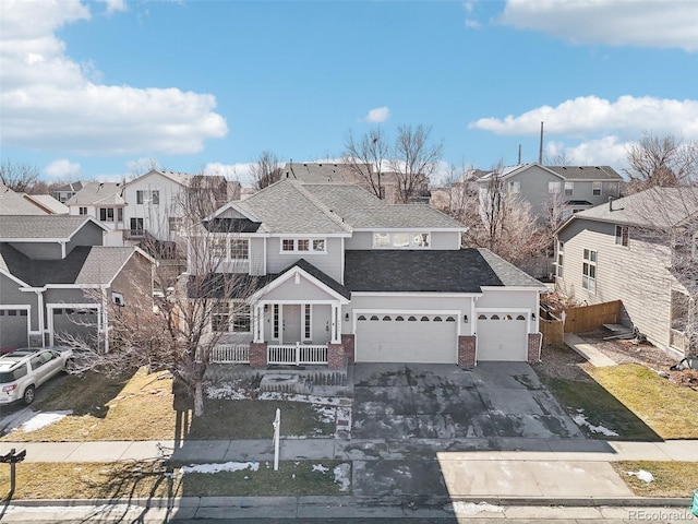 4844 Mt Evans St, Brighton, CO 80601 - traditional-style house featuring a residential view, brick siding, concrete driveway, and a porch