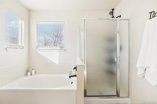 4844 Mt Evans St, Brighton, CO 80601 - full bath featuring a stall shower and a garden tub